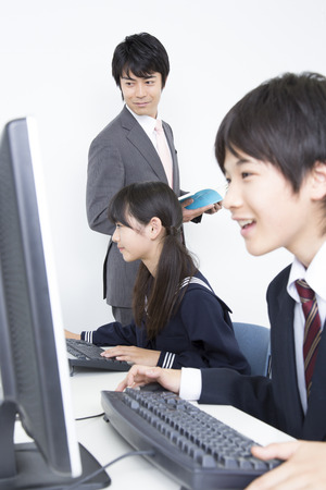 Junior high school students learn computerの写真素材