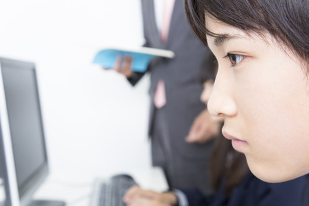 Learn the personal computer male junior high school studentsの写真素材