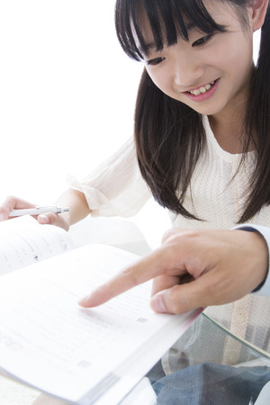 Father teach daughter to study andの写真素材