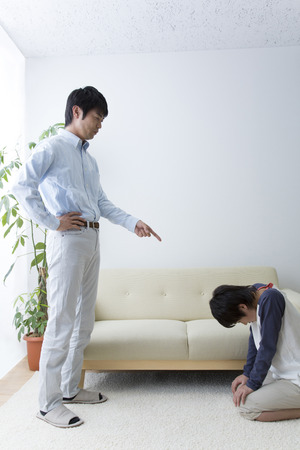 Father reprimand the sonの写真素材
