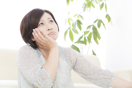 Middle woman suffering to month elbowの写真素材