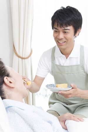 Caregiver to the dietary supplementの写真素材