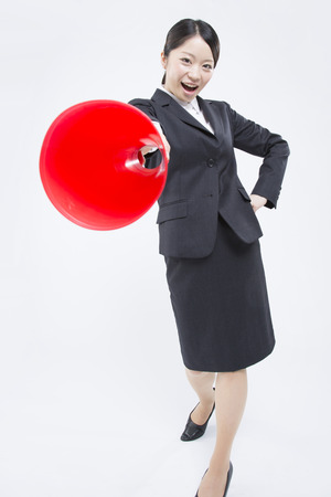 On active woman with a megaphoneの写真素材