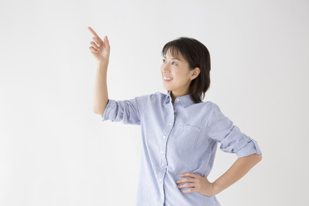 Woman pointing toの写真素材