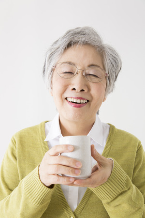Senior woman drinking teaの写真素材