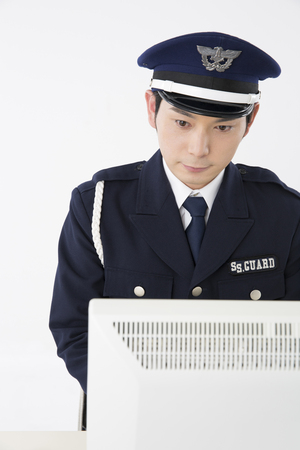 Security guards to stare the displayの写真素材