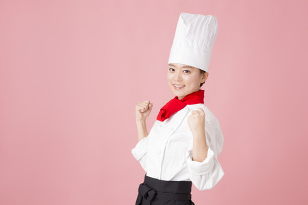 Pastry chef for the guts poseの写真素材