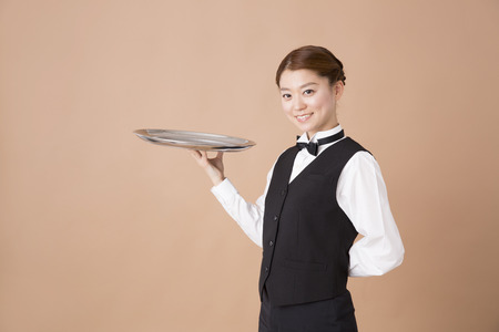 Waiter with a trench