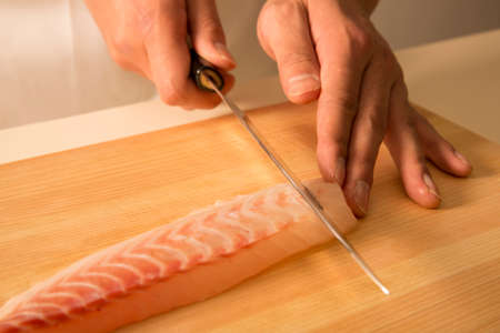Hand cut sashimi chefの写真素材