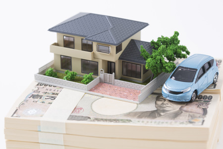 Model placed the house and the car on top of the wadの写真素材