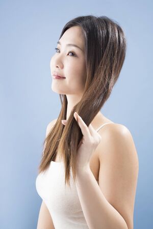 Touch the hair womenの写真素材