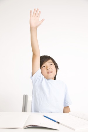 Children to raise their handsの写真素材