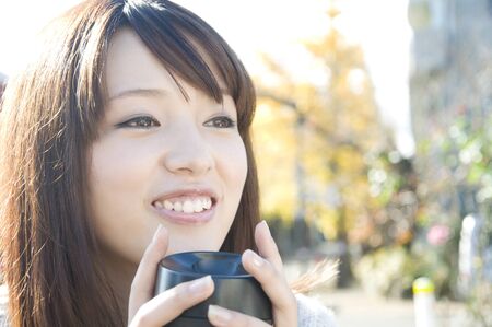 Smile of women with a tumblerの写真素材