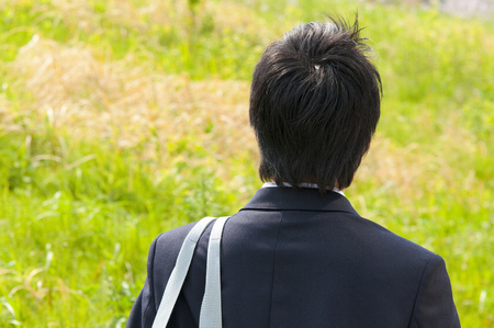 Rear View of the high school boyの写真素材