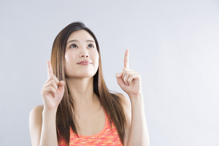 Woman pointing toの写真素材