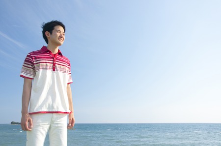 Man pointing to a sky fingerの写真素材