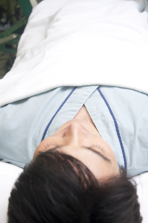 Men enter oxygen capsuleの写真素材