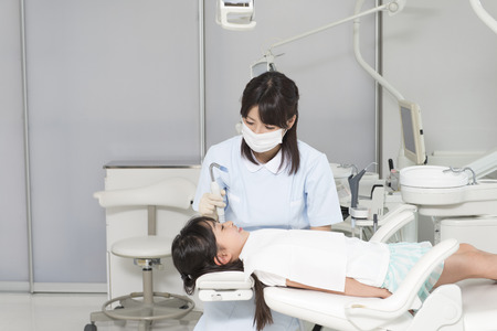 Dental hygienist for the treatmentの写真素材