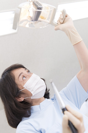 Woman dentist for treatmentの写真素材