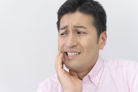 Men complain of tooth painの写真素材