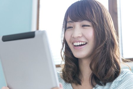 Women touch Tablet PCの写真素材