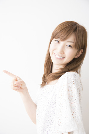 Woman pointing toの写真素材