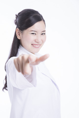 Woman doctor pointing toの写真素材