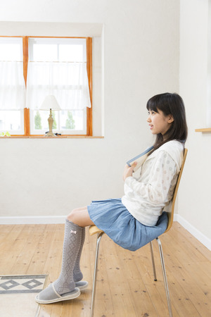 Girl reading bookの写真素材