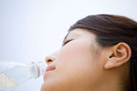 Woman drinking waterの写真素材