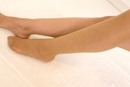 Feet of woman wearing stockingsの写真素材