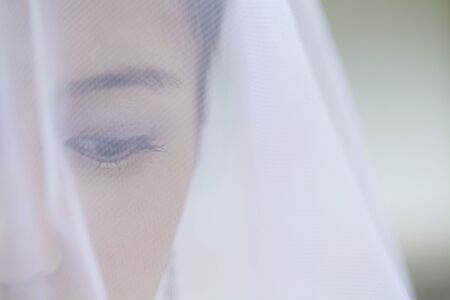 Bride of face-up suffered a veilの写真素材