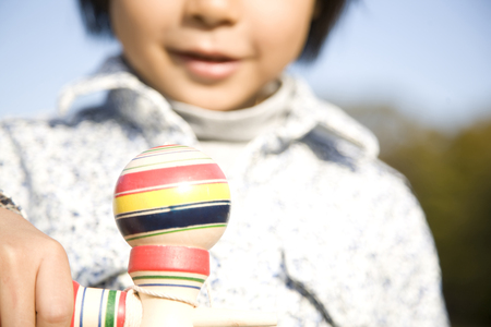 Elementary school students with a kendamaの写真素材