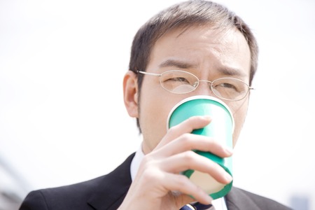 Businessmen drinkの写真素材