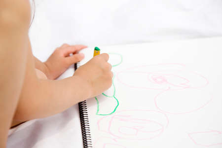 Hand of the girl to the painting