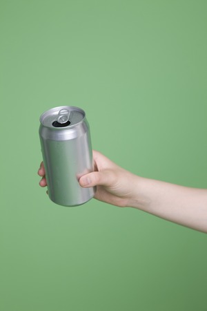 Women with empty cansの写真素材