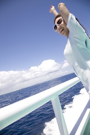 Woman on the ferry offers viewsの写真素材