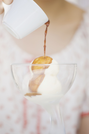 Hand of women who try to eat a dessertの写真素材