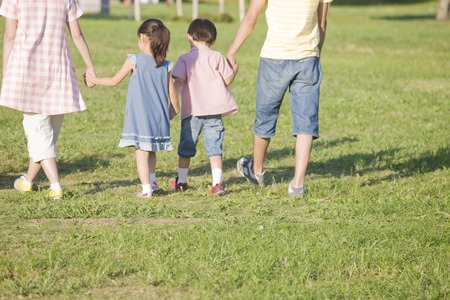 Family walking the campgroundの写真素材