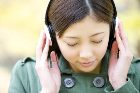 Women who wear headphonesの写真素材
