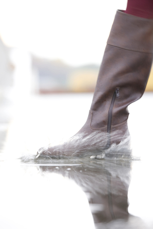 Feet of women who walk the water reservoir
