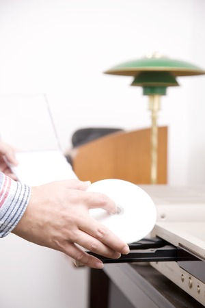 Handy man to set CDの写真素材