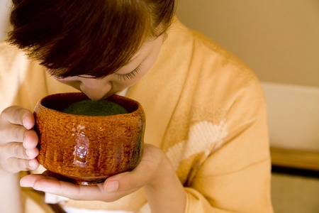 Woman drinking teaの写真素材