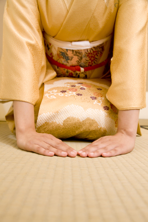 Hand of women take both hands to foldの写真素材