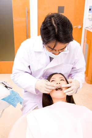 Female patient and dentist during treatment