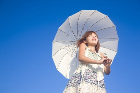 Woman with a parasolの写真素材