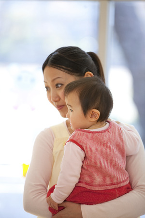 Female infant with nurseryの写真素材