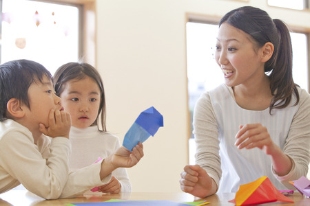 Fold the origami nursery and kindergartenの写真素材