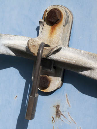Container opening and closing the lock of