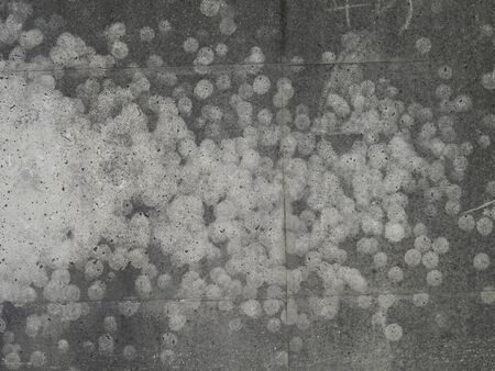 And threw traces of baseball balls attached to the concrete wall