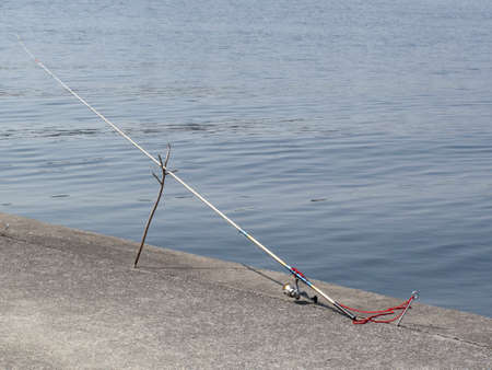 Fishing rod that was set in the riverbed
